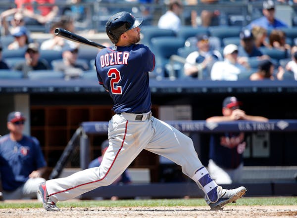 Brian Dozier (2) hit his first home run of spring training on Friday.