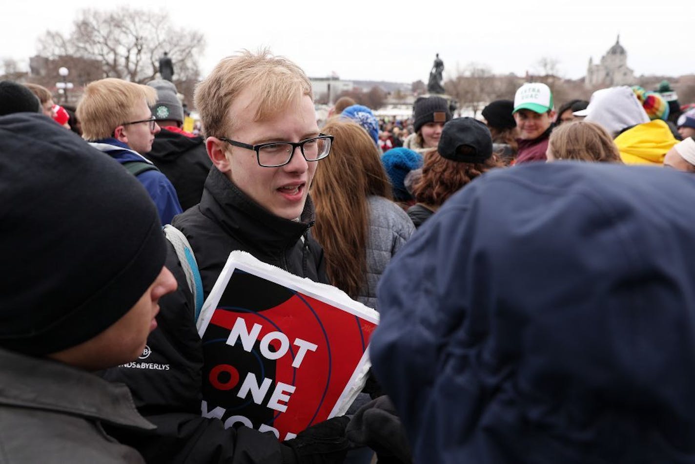 Ben Jaeger, 16, who helped organize Saturday's march and rally against gun violence talked with fellow organizers at the State Capitol as part of the national March for Our Lives event.