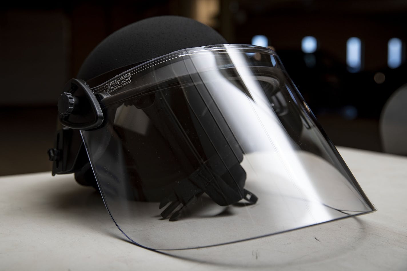 A riot helmet sat out on a table to display some of the new riot equipment. ]
ALEX KORMANN &#x2022; alex.kormann@startribune.com The Duluth police department has 125 new complete sets of riot gear with an emphasis on transparency of officers.