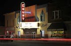Traffic passes by the Court Street Theatre Monday, June 29, 2020, as the marque signals its reopening date in Saginaw, Mich. The unemployment rate aro