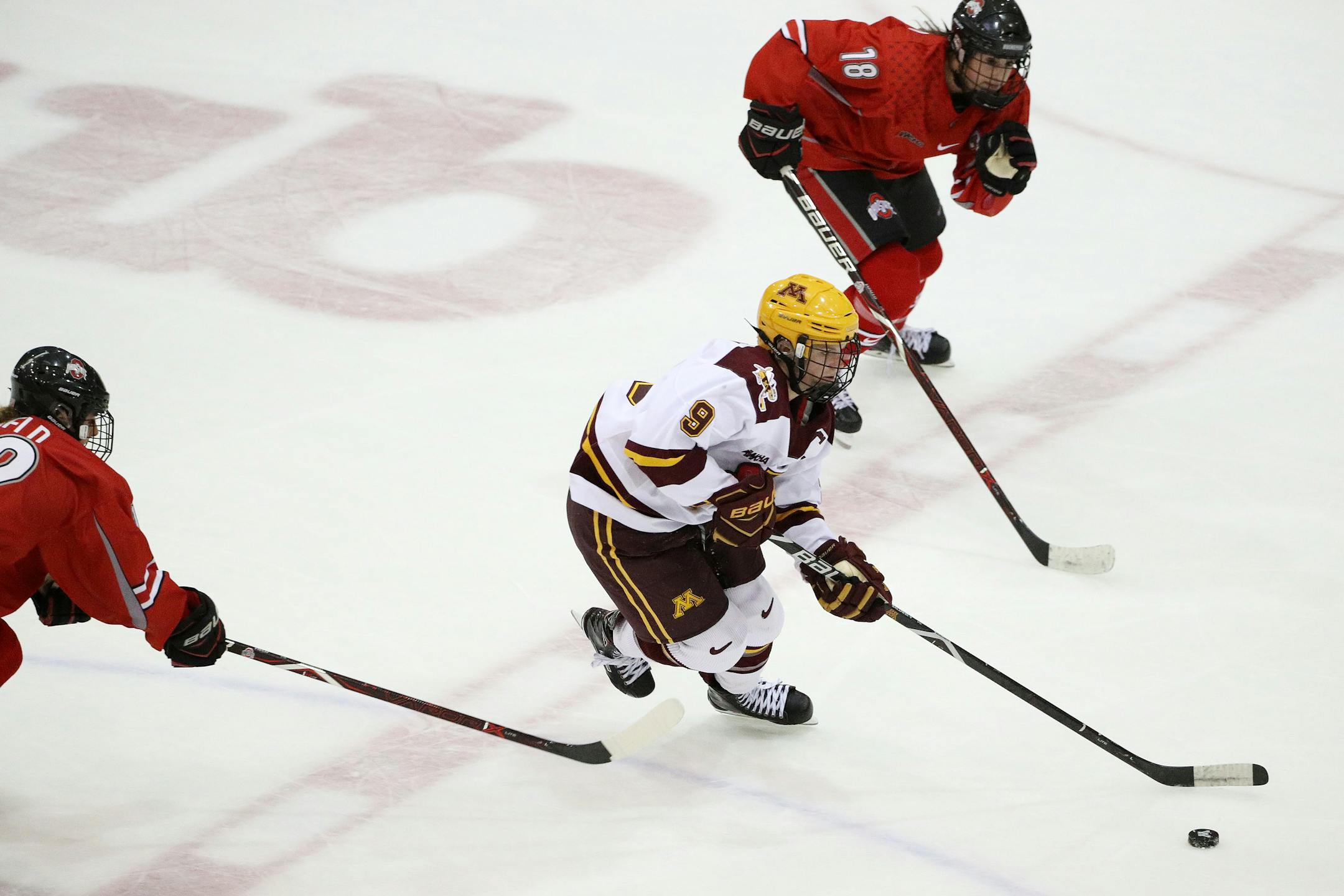 Gophers defenseman Sydney Baldwin took the puck down the ice against Ohio State in October.