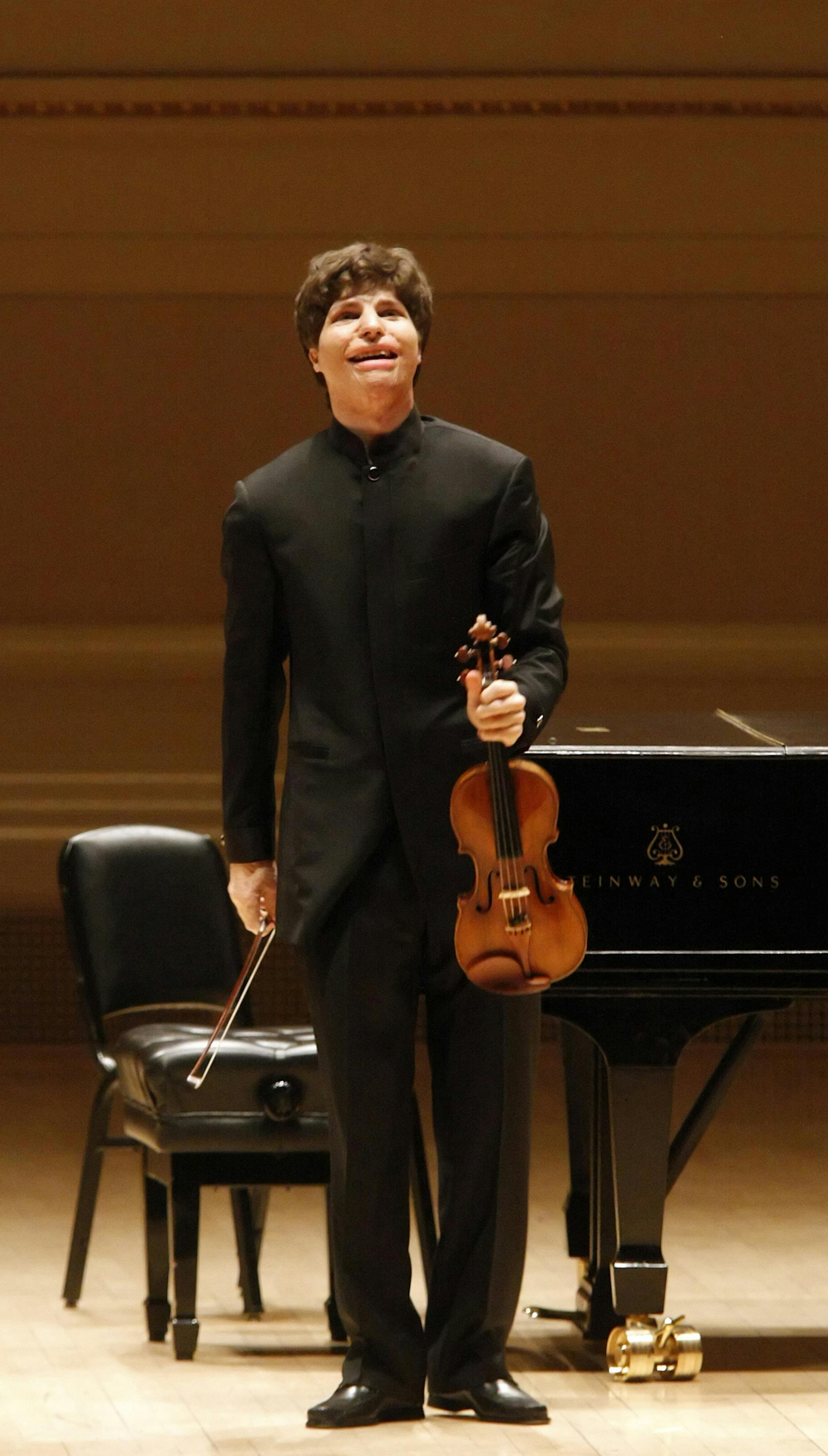 FILE -- Violinist Augustin Hadelich at his recital debut in Carnegie Hall in New York, March 28, 2008. After a burn accident at age 15 that jeopardized his ability to play, Hadelich has become one of the most distinctive violinists of his generation. (Erin Baiano/The New York Times) ORG XMIT: NYT75
