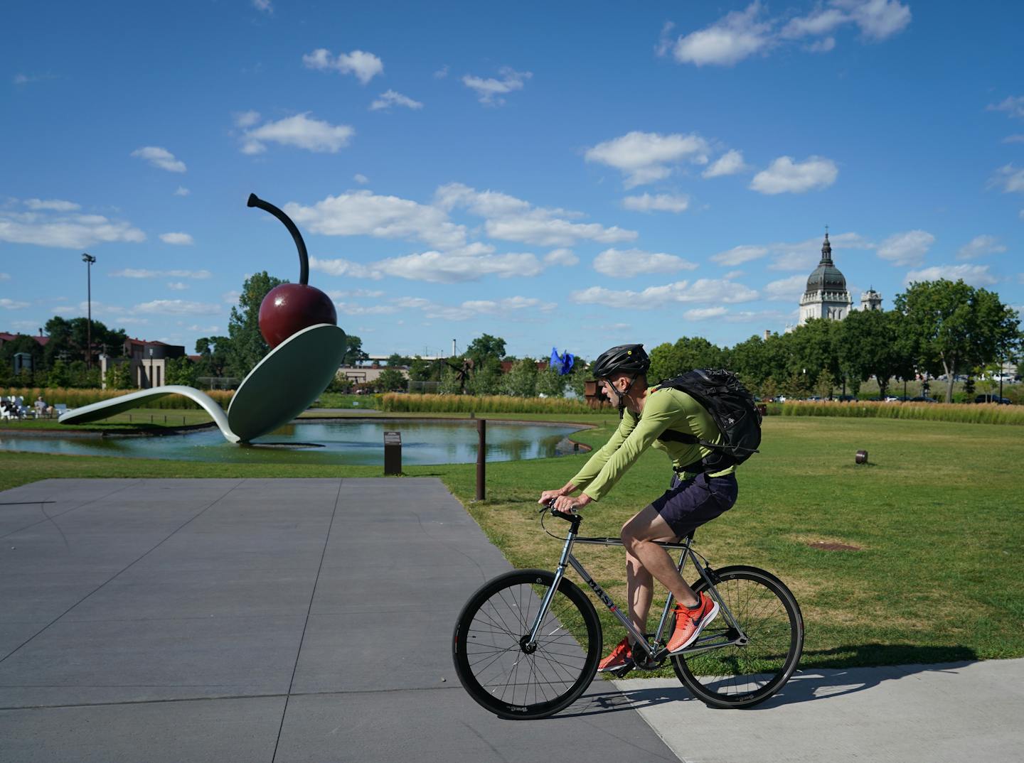 Bicyclists rode through the Minneapolis Sculpture Garden on Thursday, August 8, 2019. With Southwest Light Rail Construction, bikers that typically commute to work in and out of the cities have been forced off of bike trails (like Cedar Lake) and into spots where they generally wouldn't be, like Loring Park or the Minneapolis Sculpture Garden. ] Shari L. Gross &#x2022; shari.gross@startribune.com With Southwest Light Rail Construction, bikers that typically commute to work in and out of the citi