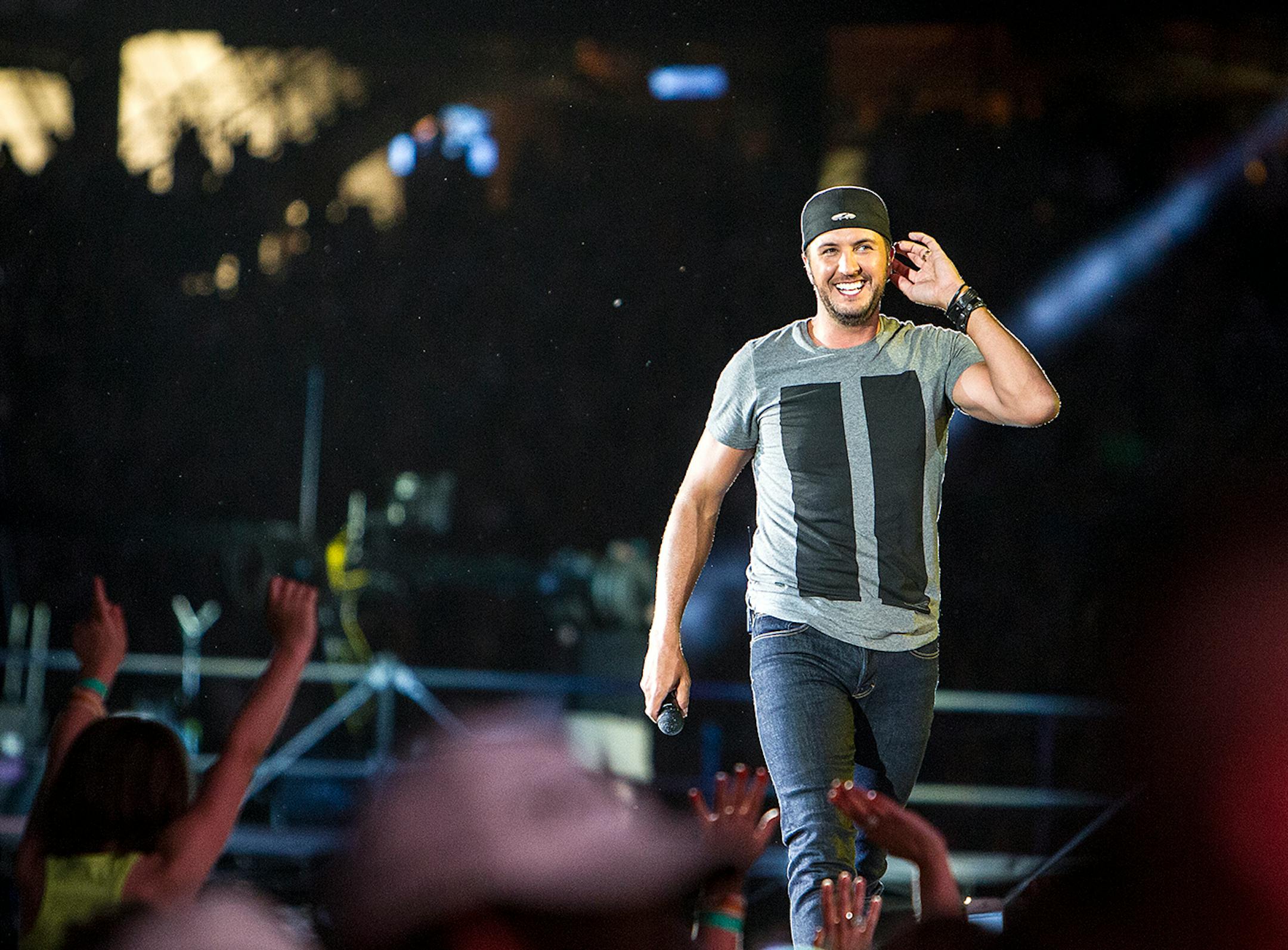 Luke Bryan performs during his Kick The Dust Up Tour at TCF Bank Stadium in Minneapolis June 20, 2015.