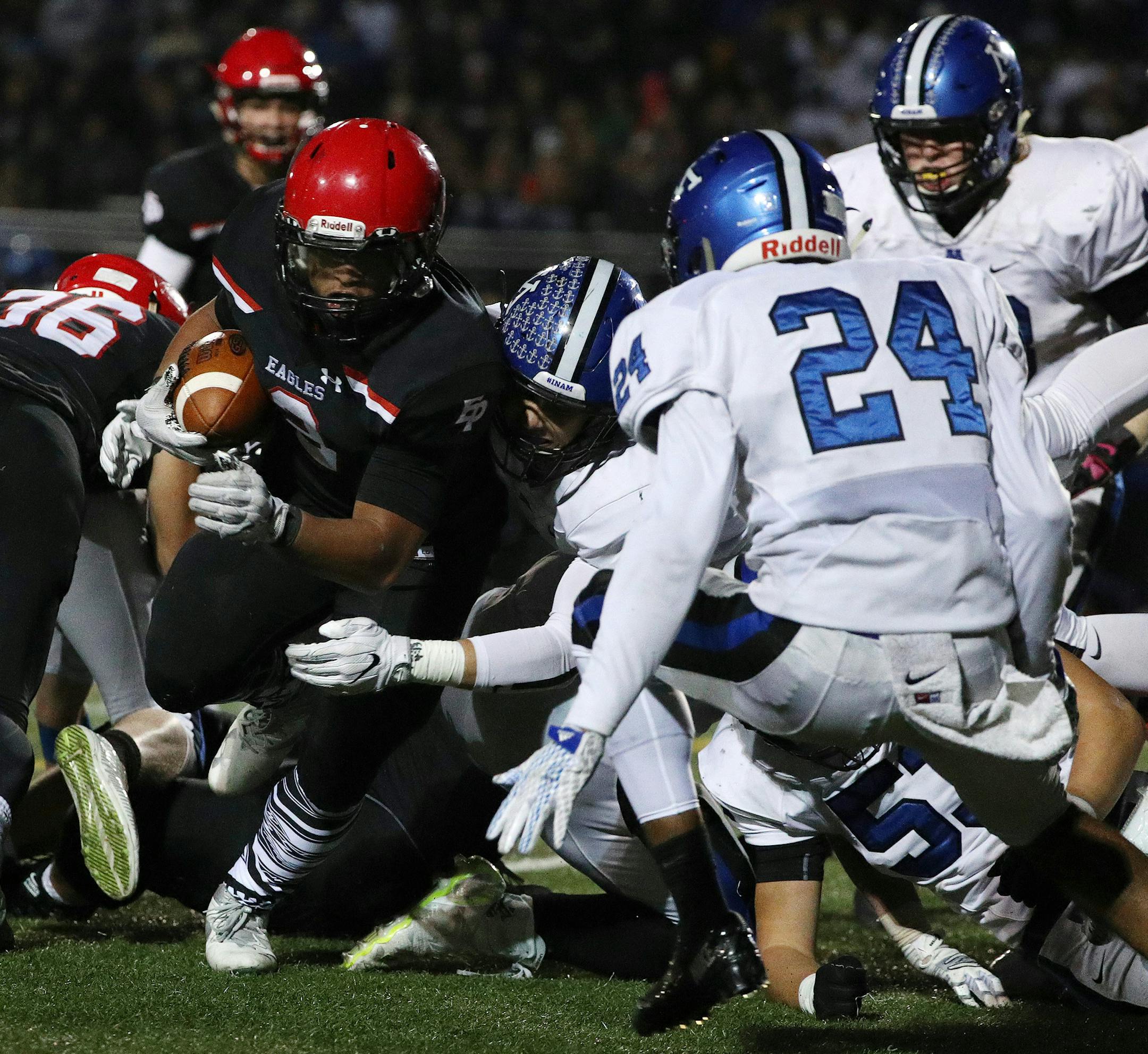 Eden Prairie wide receiver Jack Tuttle (3) tried to make his way around the Minnetonka defense as he ran the ball in the second half. ] ANTHONY SOUFFLE ï anthony.souffle@startribune.com Game action from a high school football game between Eden Prairie and Minnetonka Friday, Oct. 13, 2017 at Eden Prairie High School in Eden Prairie, Minn.