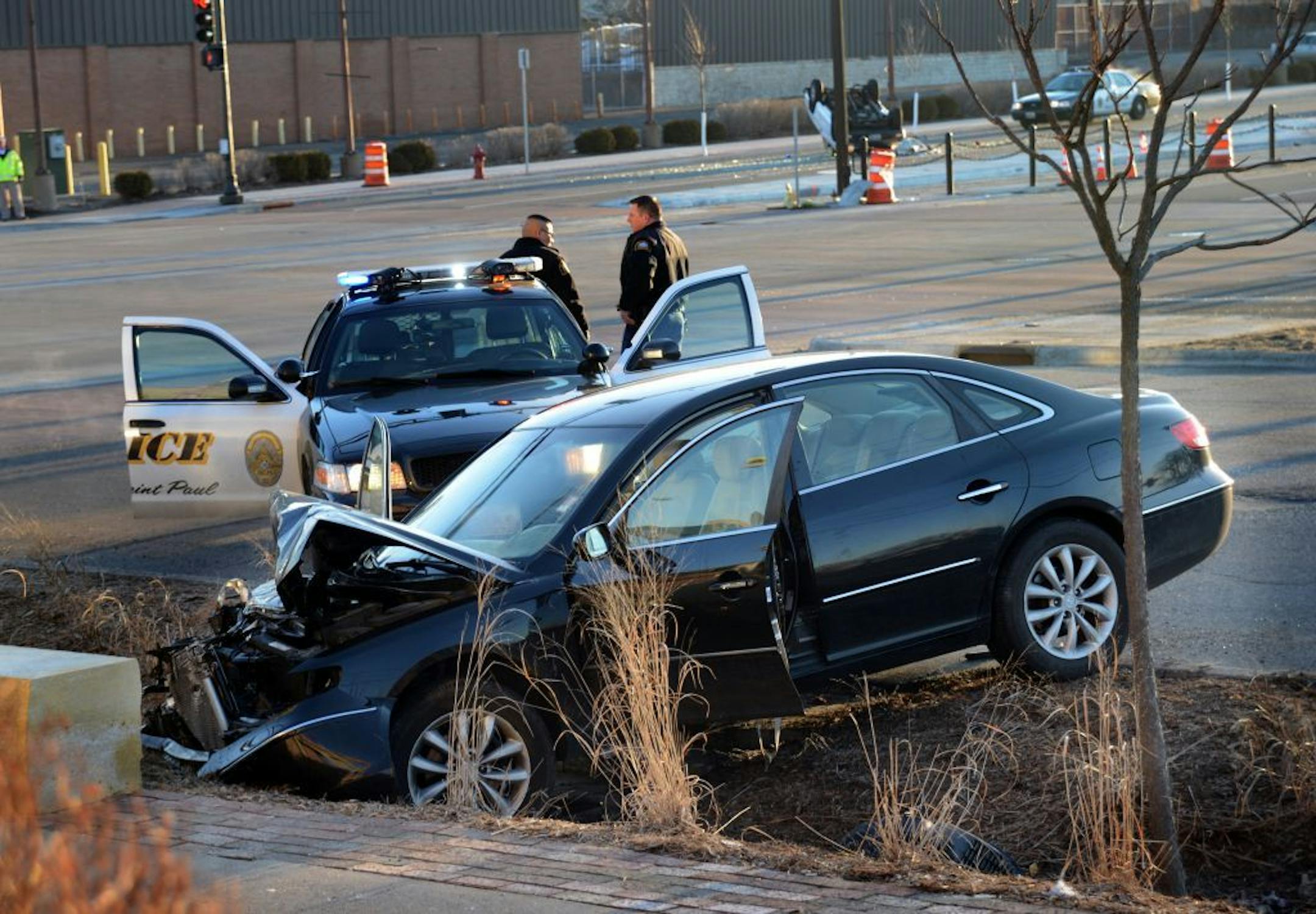 A police chase ended with the pickup truck flipped over at the intersection of Marion St and University Ave in St Paul on Wednesday April 3 ,2013. This was part of the accident scene where this car ended up in front of thge McDonalds on University ave.