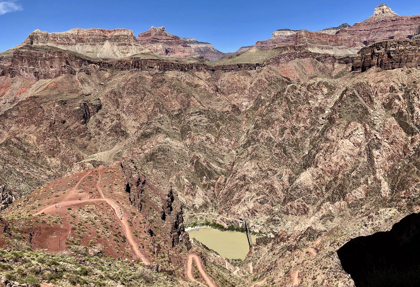 Hiking the Grand Canyon in one day, down and up, requires an early start, but the rewards include beautiful vistas and snow on the North Rim.