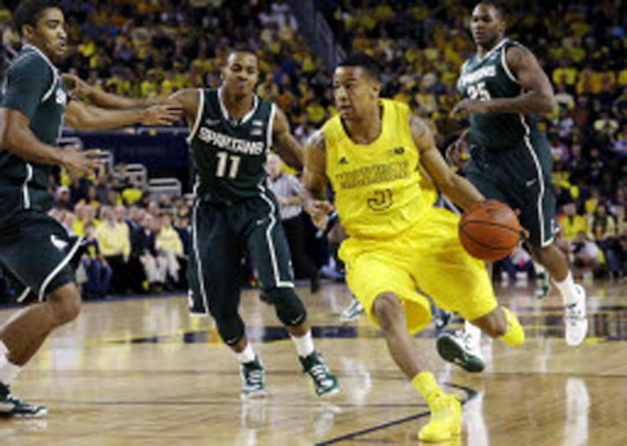 Michigan guard Trey Burke (3)