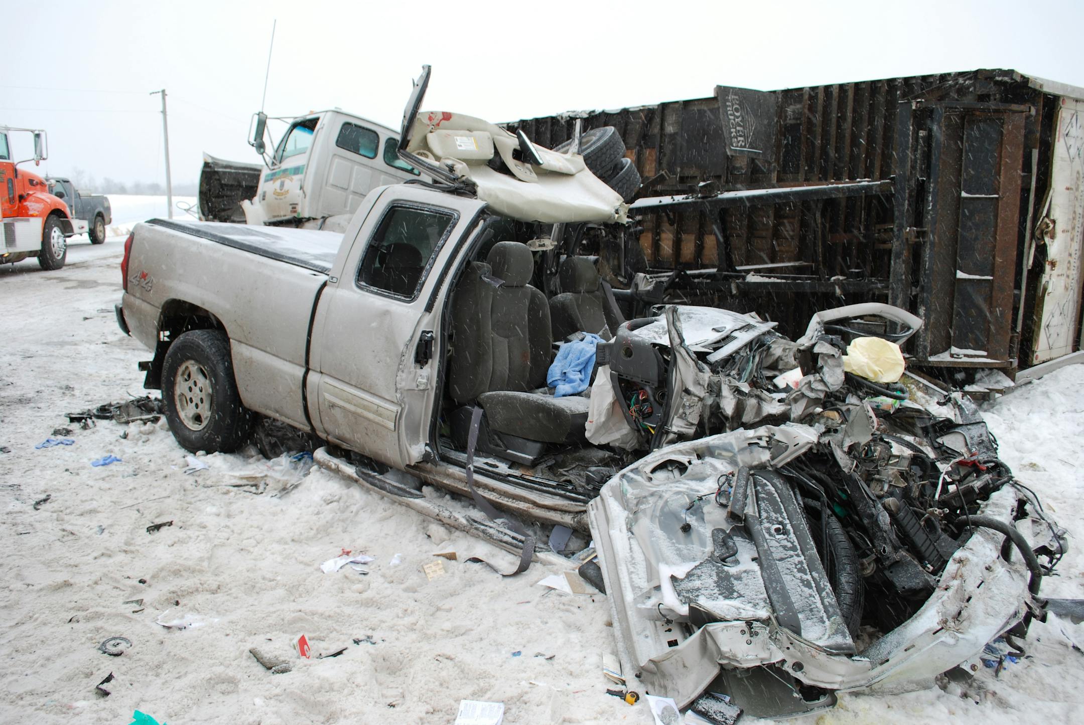 A Twin Cities freight truck and a pickup were left mangled after colliding at an intersection in western Wisconsin between Luck and Cumberland.