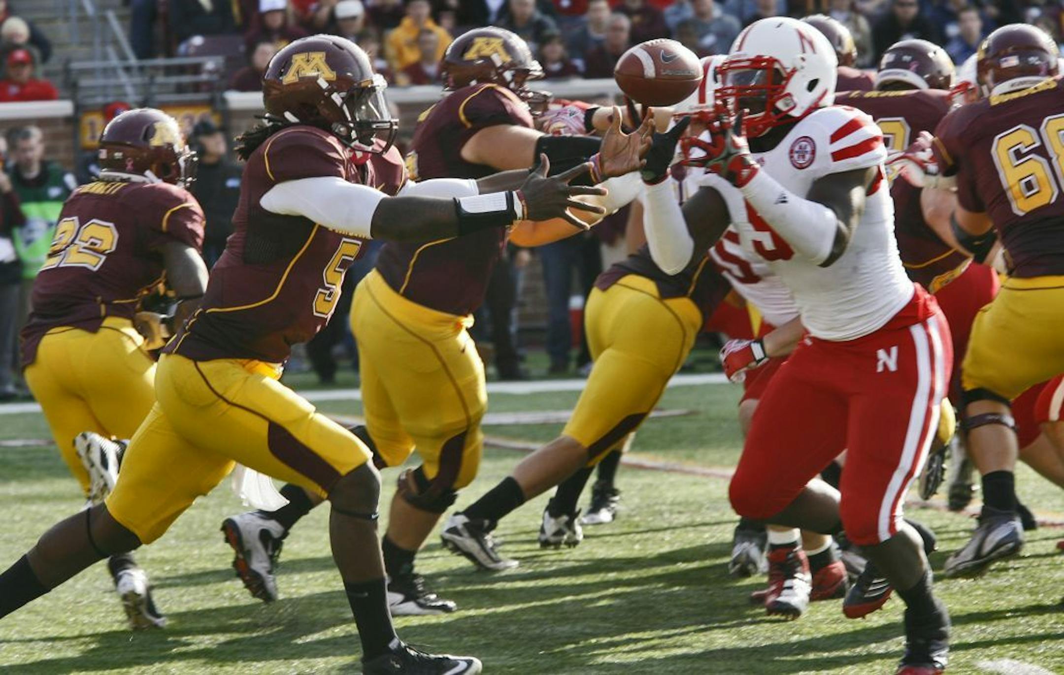 Minnesota Gophers football vs. Nebraska Cornhuskers. Gophers quarterback MarQueis Gray, left fumbled the ball in first half action that resulted in a Nebraska recovery and run for a touchdown.