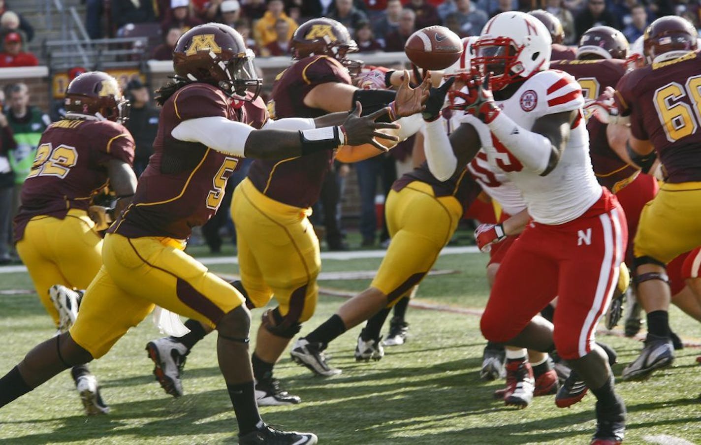 Minnesota Gophers football vs. Nebraska Cornhuskers. Gophers quarterback MarQueis Gray, left fumbled the ball in first half action that resulted in a Nebraska recovery and run for a touchdown.