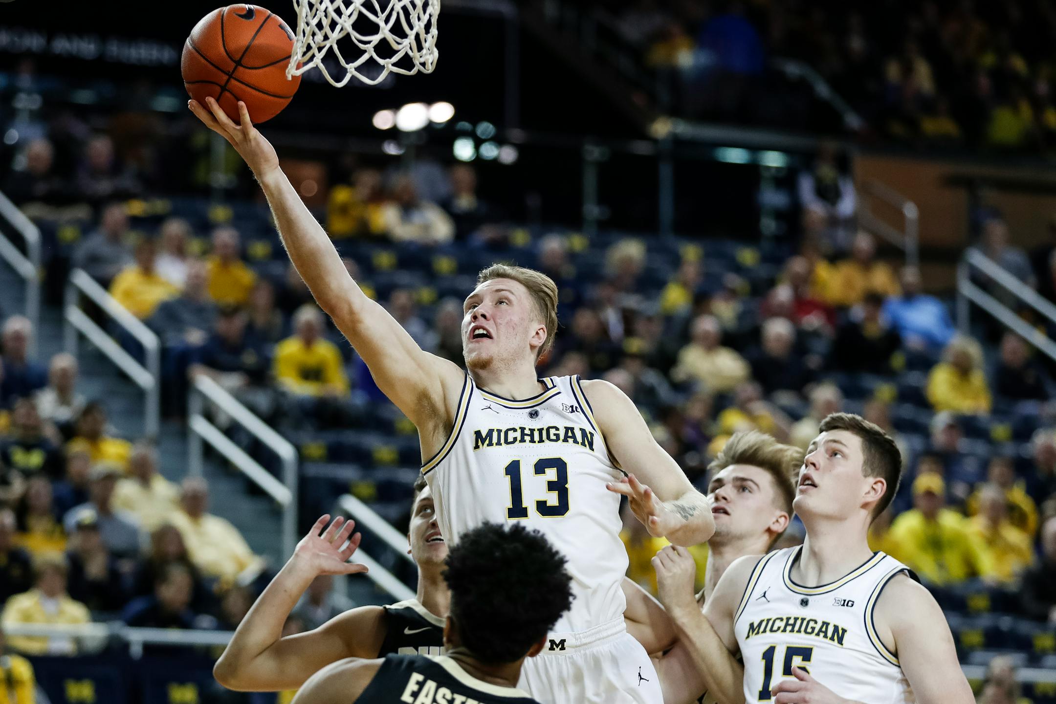 Michigan forward Iggy Brazdeikis is one of an increasing number of college basketball stars from Canada.