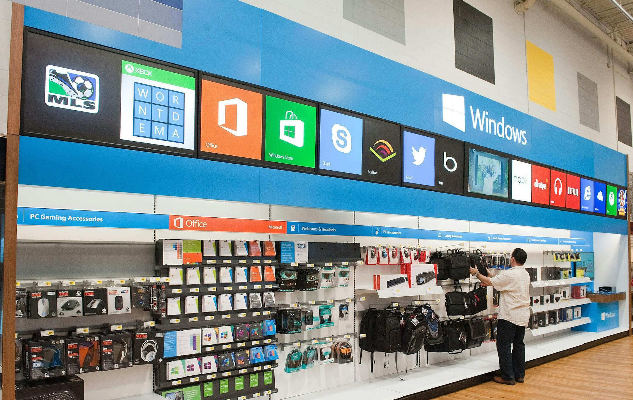 This undated photo provided by Microsoft, shows windows store at Best Buy. Best Buy announced Thursday, June 13, 2013, it is partnering with Microsoft to feature a store-within-a-store for its Windows products, the latest major consumer electronics retailer to acknowledge advantages of the brick-and-mortar format (AP Photo/Microsoft Corp) ORG XMIT: MIN2013061315150543