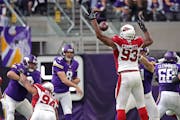 Vikings quarterback Sam Bradford throws an incomplete pass that was tipped by Arizona&#xed;s Calais Campbell in the 1st half. ] Minnesota Vikings -vs-