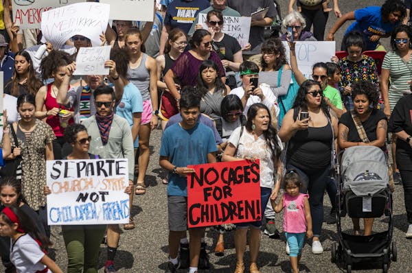The March to Protect Children and Families Wednesday made its way down E. 7th Street in St. Paul toward City Hall.