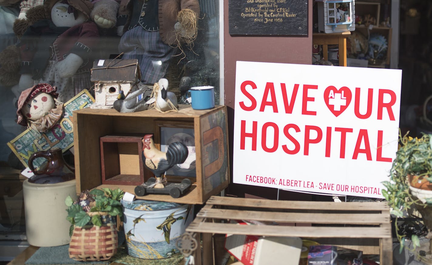 Eloise Adams carried antiques on the sidewalk, as she started the morning at her shop "Adams Originals Shop" Thursday August 24,2017 in Albert Lea, MN. Elise and her husband Jack Adams have been married for 57 years, and their last child was born at the Mayo Hospital. Jack has had two strokes, and is worried about what he would do if the hospital were to close. The Mayo Clinic's plan to remove key inpatient and obstetrics services from its hospital in Albert Lea has caused uproar. ] JERRY HOLT &