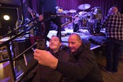 Richard and Mason McDeid took a selfie before the Helmet concert. After the show, the band&#x2019;s guitarist gave Mason a set list and pick, adding t