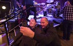 Richard and Mason McDeid took a selfie before the Helmet concert. After the show, the band&#x2019;s guitarist gave Mason a set list and pick, adding t
