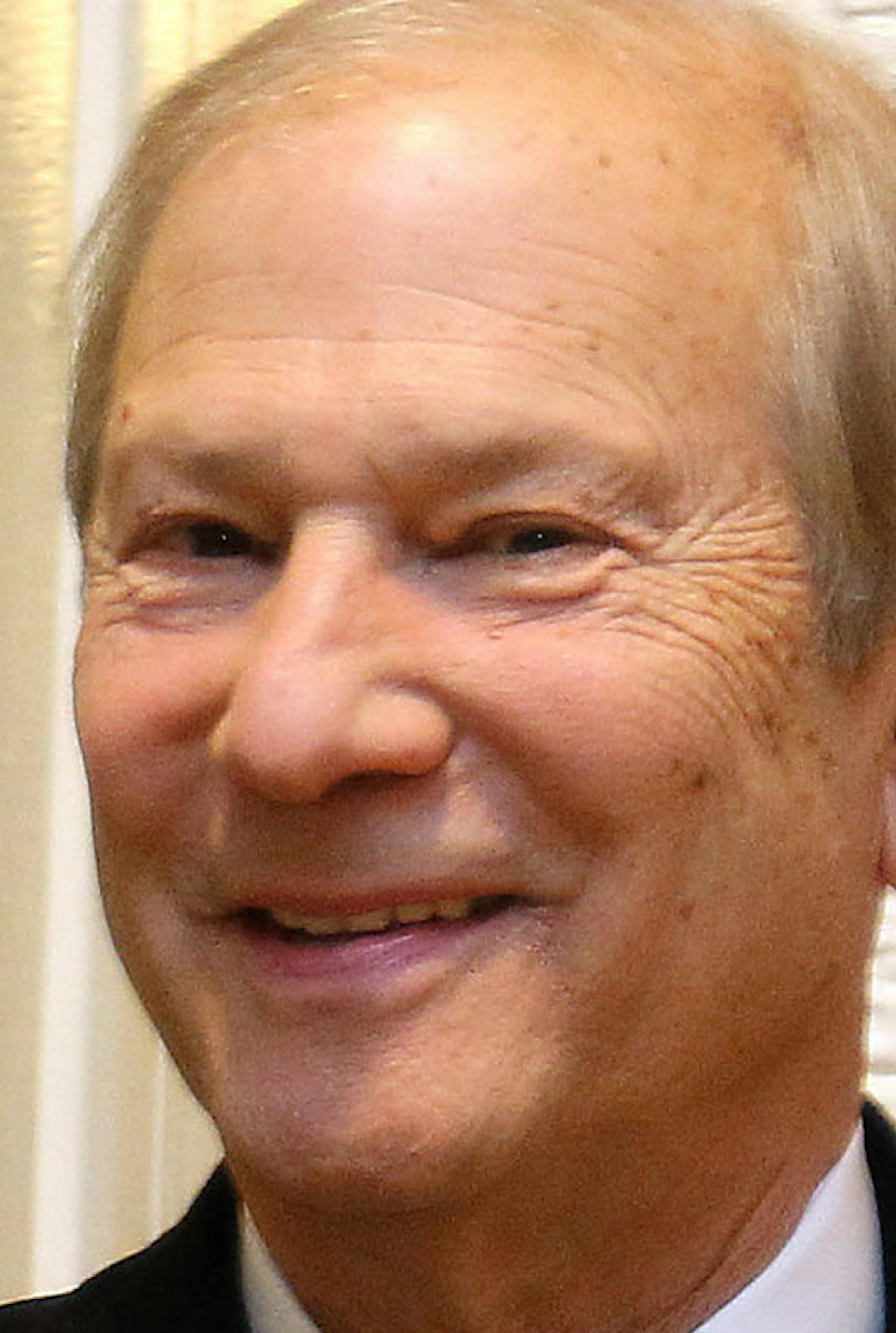 File- This Nov. 20, 2013, file photo shows Interstate General Media minority owner Lewis Katz smiling as he leaves the court room inside City Hall in Philadelphia. Katz, a self-made man who built his fortune in New York parking lots, billboards and cable TV, and went on to buy the NBA's New Jersey Nets, NHL's New Jersey Devils and The Philadelphia Inquirer, died in a weekend plane crash. He was 72. (AP Photo/Philadelphia Daily News, David Maialetti)