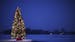 A Christmas tree sits on a dock in the snow at White Bear Lake in Minnesota on Monday, Nov. 30, 2015. (Jeff Wheeler/Minneapolis Star Tribune/TNS)