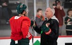 The Wild's new interim coach Dean Evason talked with Luke Kunin during practice at Tria Rink in St. Paul, Minn., on Friday, February 14, 2020. ] RENEE