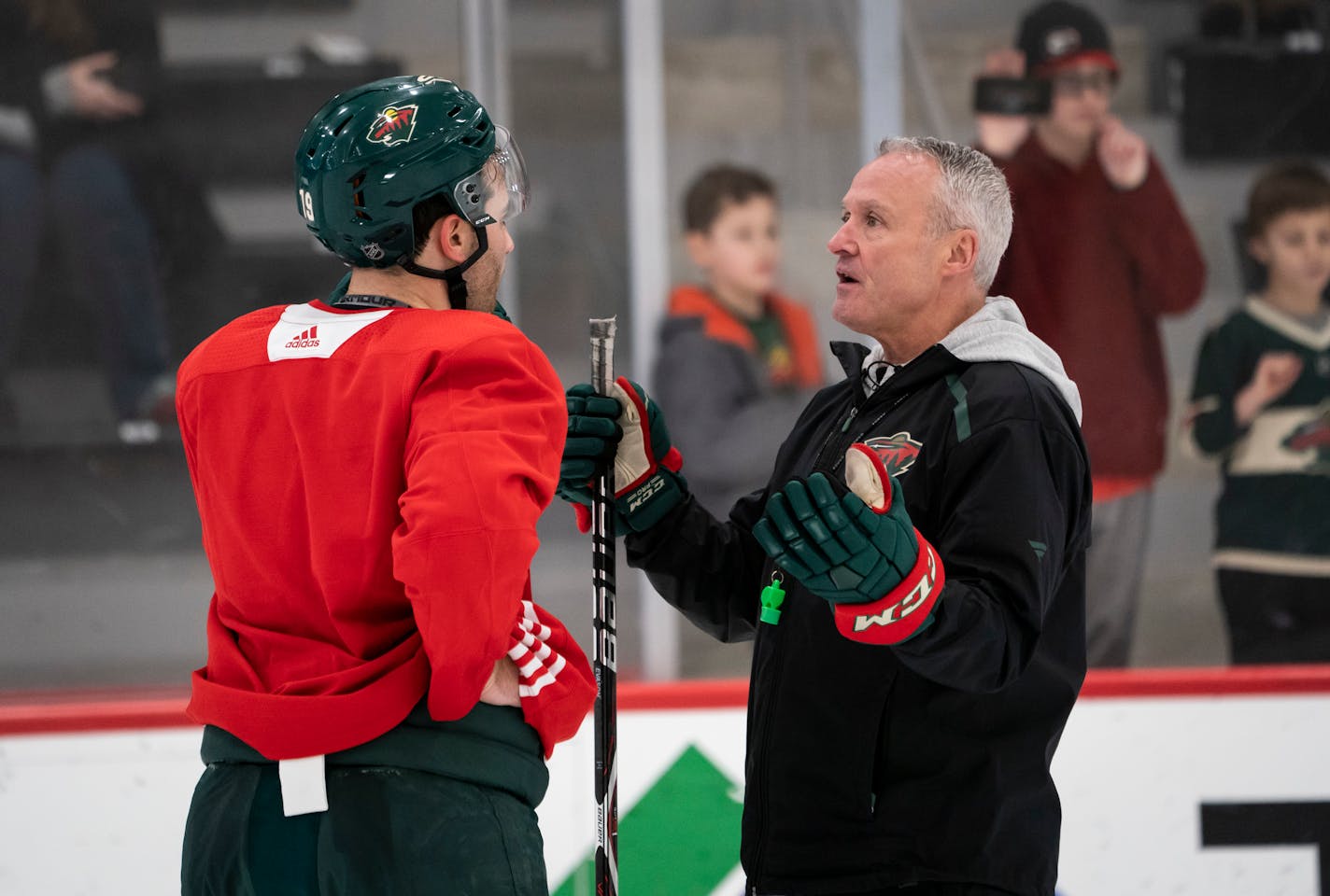 The Wild's new interim coach Dean Evason talked with Luke Kunin during practice at Tria Rink in St. Paul, Minn., on Friday, February 14, 2020. ] RENEE JONES SCHNEIDER ¥ renee.jones@startribune.com