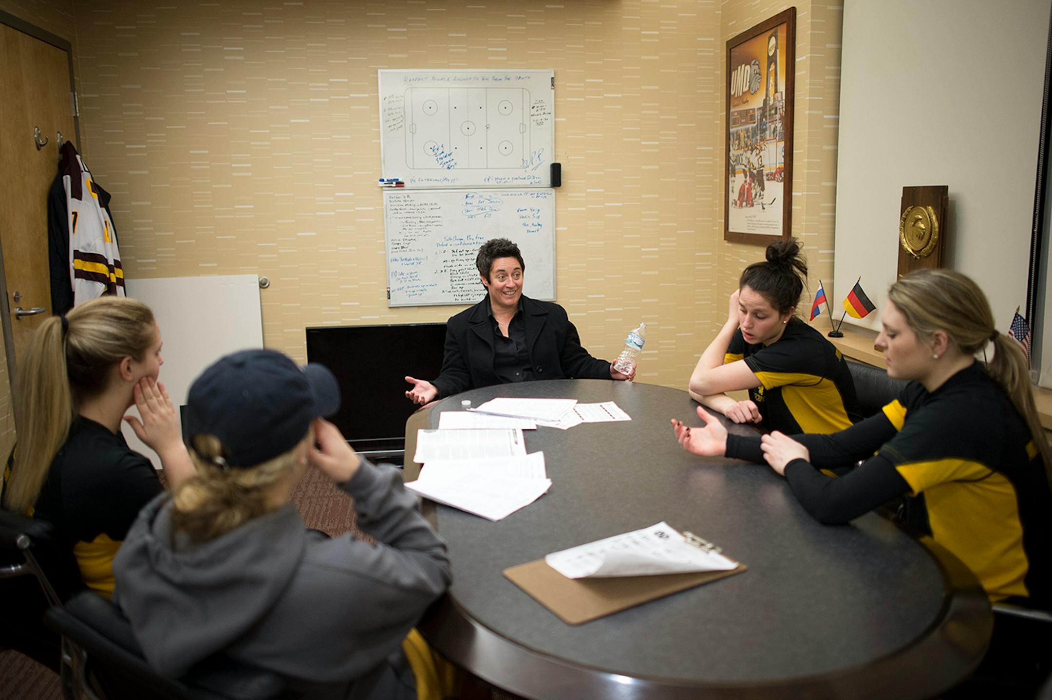UMD womens' hockey head coach, Shannon Miller, center, talks with her team captains after Saturday night's loss against University of North Dakota. The captains are, from left, Brienna Gillanders, Zoe Hickel, Jenna McParland and Emma Stauber. ] (Aaron Lavinsky | StarTribune) University of Minnesota Duluth told women's hockey head coach Shannon Miller that this season would be the las of her successful run as the Bulldog's coach. After five national championships, an NCAA record, and 11 Frozen Fo