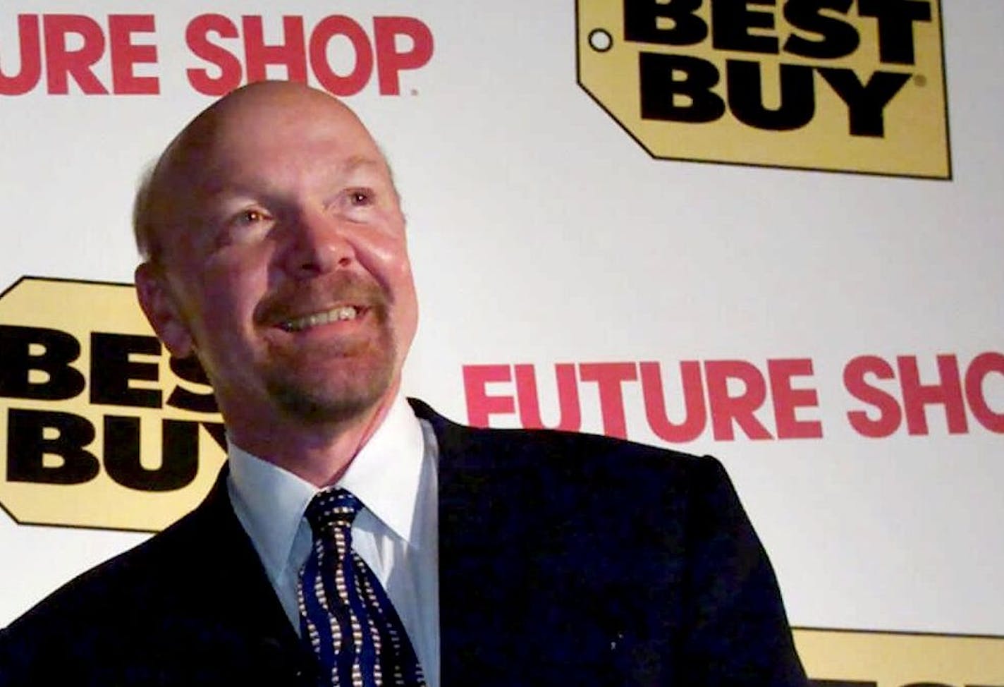 FILE- This Tuesday, Aug. 14, 2001, file photo, shows Richard Schulze following a news conference in Vancouver. Schulze, the founder and outgoing chairman of Best Buy, announced his resignation from the board Thursday June 7, 2012, and said that he and may sell off his 20.1 percent stake in the beleaguered electronics retailer.