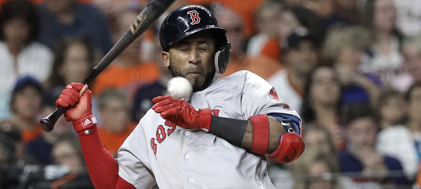 Boston Red Sox's Eduardo Nunez is hit by a pitch thrown by Houston Astros' Charlie Morton during the sixth inning of a baseball game Sunday, June 3, 2018, in Houston. (AP Photo/David J. Phillip)