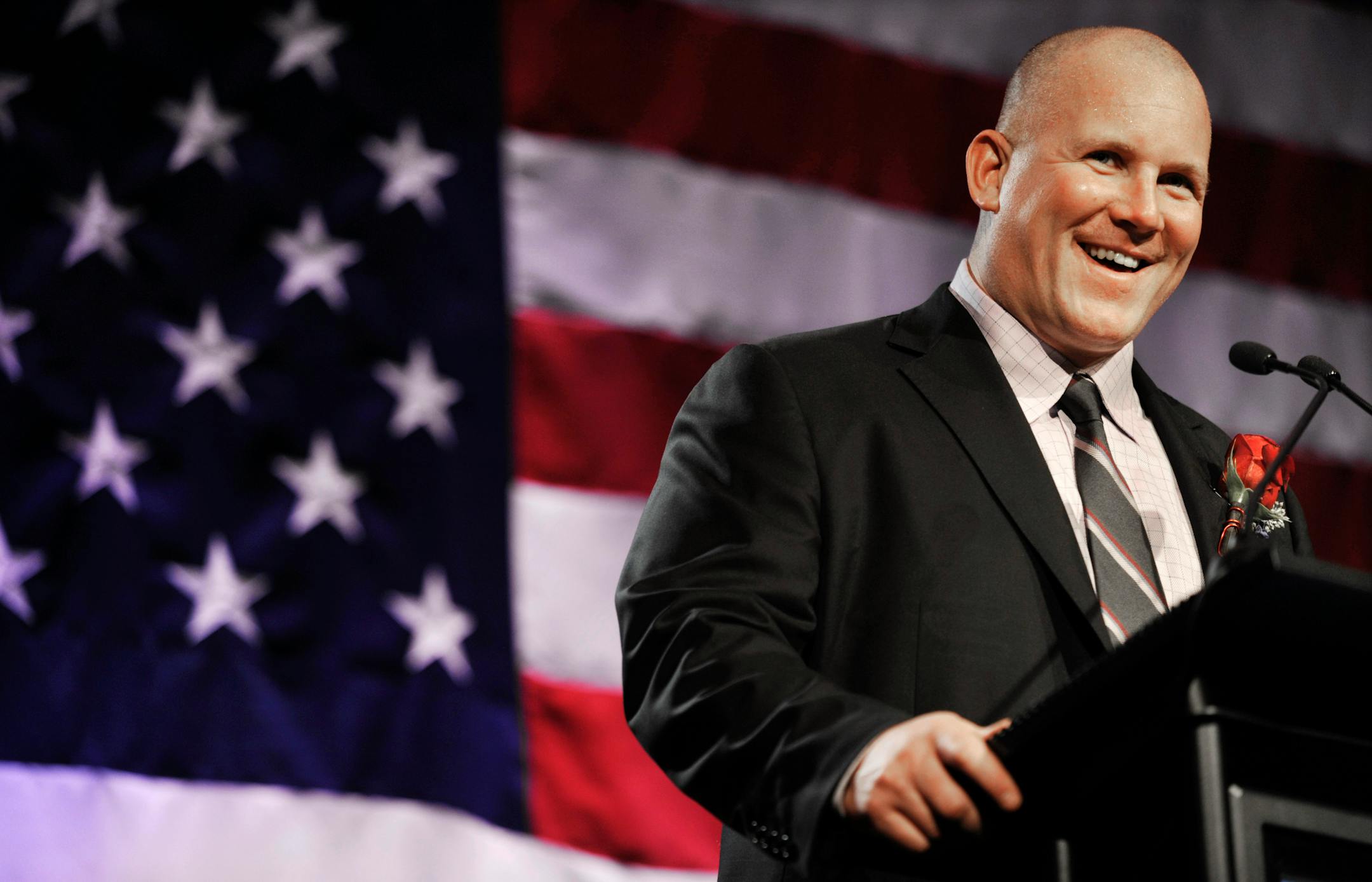Keith Tkachuk speaks after being inducted into the U.S. Hockey Hall of Fame during a ceremony and dinner in Chicago, Monday, Dec. 12, 2011. Tkachuk was joined by three-time Norris Trophy winner and four-time Olympian Chris Chelios, defenseman Gary Suter, Philadelphia Flyers owner Ed Snider and broadcaster Mike Emrick. (AP Photo/Paul Beaty)