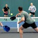 Eric Theriault, left, RJ Singh, Freddy Akradi and Aleks Westlund play a match at Life Time Chanhassen Pickleball in April. The facility next to the co