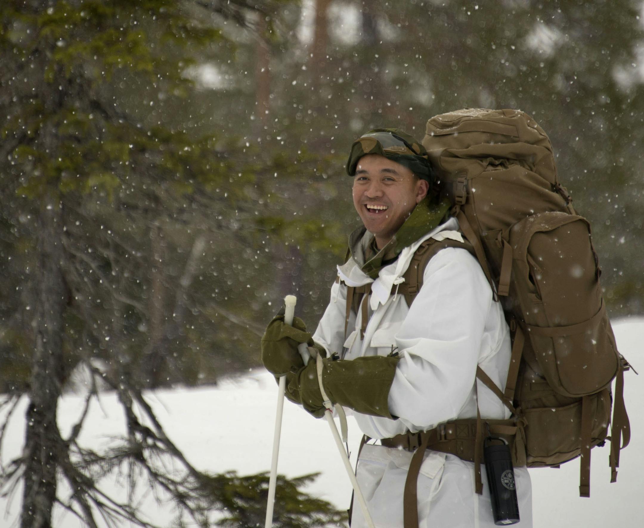 Members of the Minnesota National Guard and Norwegian Home Guard take part in a 12-mile journey into the mountains near Snaasa, Norway on Feb. 17, 2015. (Minnesota National Guard photo by Tech. Sgt. Amy M. Lovgren/ Released)
= Photographer: U.S. Air Force Technical Sergeant (in AP style "Tech Sgt.") Amy M. Lovgren, a photojournalist with the Minnesota Air National Guard's 133rd Airlift Wing based in Saint Paul (MSP airport) = Pictured is U.S. Army Sergeant (Sgt.) David Phommaracksa (no middle in