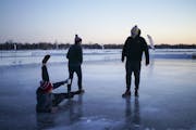 Collin McCullough spilled just a few drops of his coffee when he slipped on the ice while checking out one of the pond hockey rinks with Nick Lazenby,
