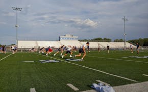 Woodbury football players took part in the first summer workout allowed with coaches on Monday. "It's a way different atmosphere when you're working w