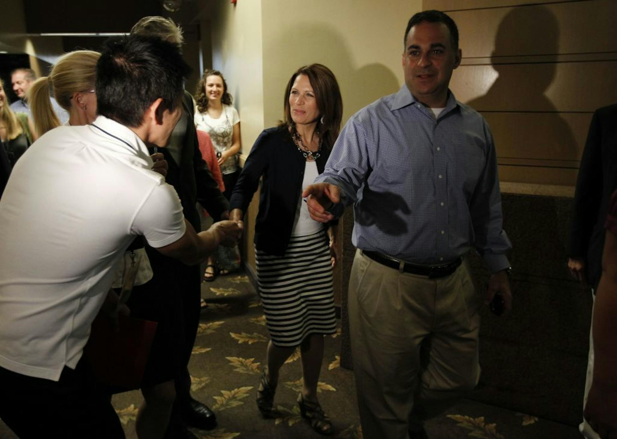Republican presidential candidate Rep. Michele Bachmann, R-Minn., arrives at a breakfast before the GOP Ames Straw Poll in Ames, Iowa, Saturday, Aug. 13, 2011.