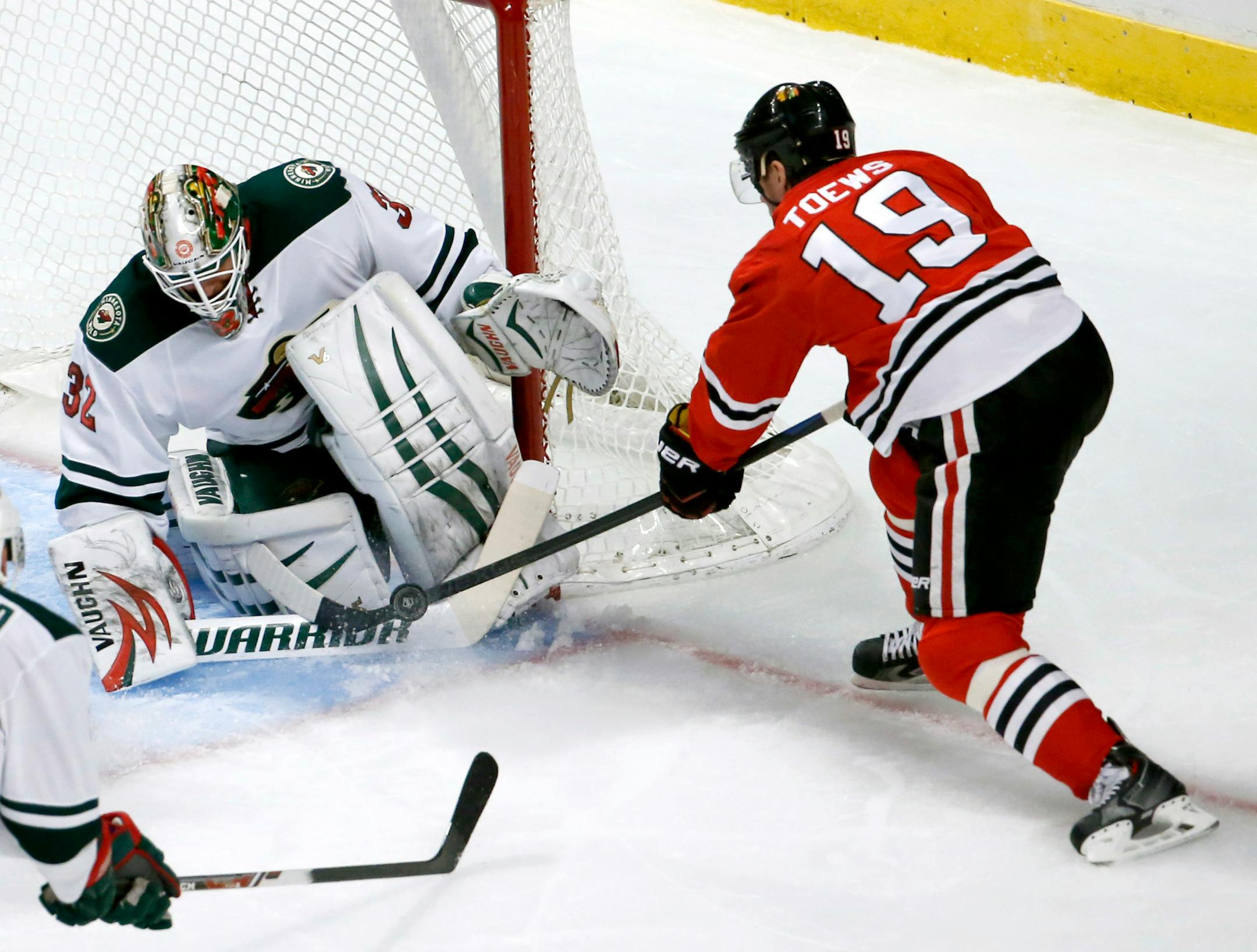 Wild goalie Niklas Backstrom, a surprise starter, made a save on Blackhawks center Jonathan Toews during the second period Tuesday.