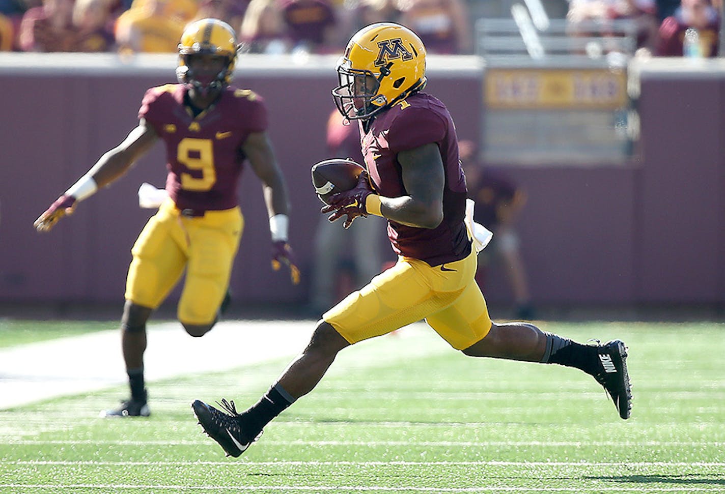 Minnesota's wide receiver KJ Maye ran the ball after a grab in the second quarter as the Gophers took on Ohio at TCF Bank Stadium, Saturday, September 26, 2015 in Minneapolis, MN.