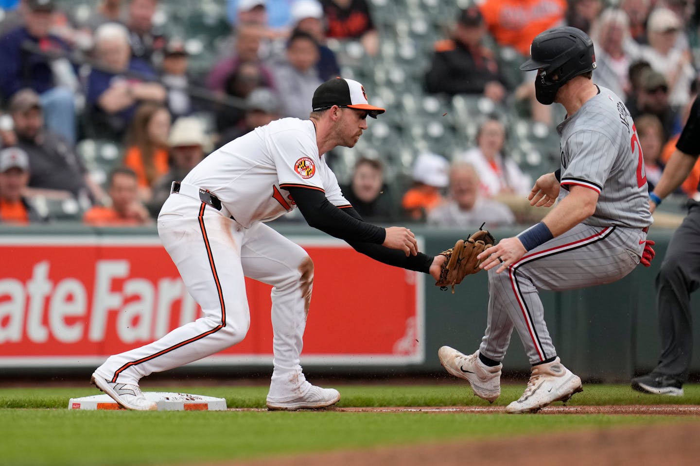 Orioles third baseman Jordan Westburg tags out Ryan Jeffers in the sixth inning Wednesday in Baltimore.