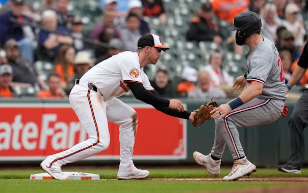 Orioles third baseman Jordan Westburg tags out Ryan Jeffers in the sixth inning Wednesday in Baltimore.