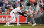 Orioles third baseman Jordan Westburg tags out Ryan Jeffers in the sixth inning Wednesday at Camden Yards in Baltimore.