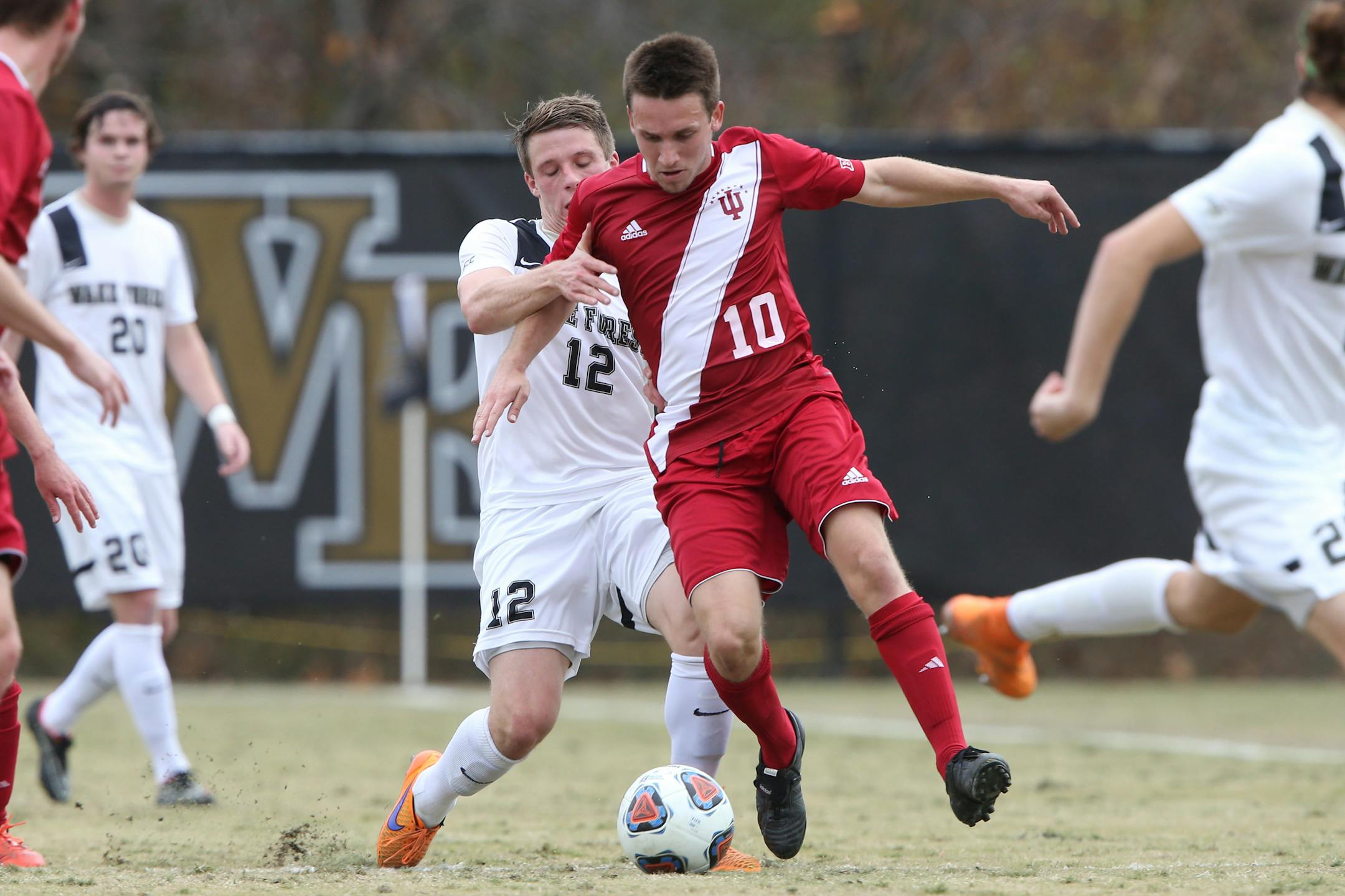 Indiana's Tanner Thompson (10) and Wake Forest's Brad Dunwell (12).
