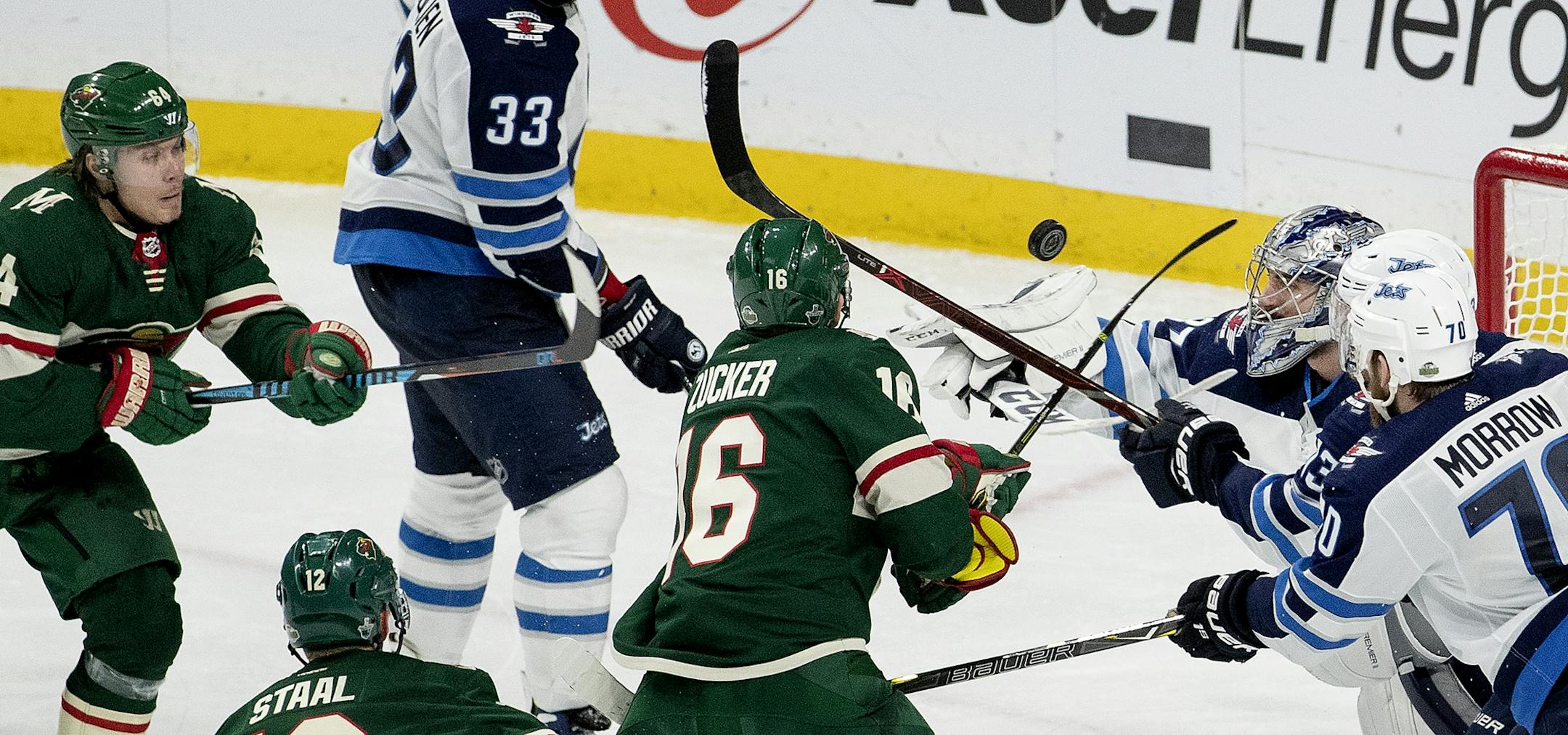 Goalie Connor Hellebuyck (37) made a save in the third period.