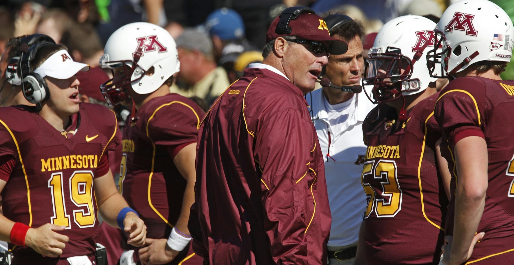 Oct. 16, 2010: Gophers head coach Tim Brewster, center and players reacted to a punt snap that sailed over punter Dan Orseske's head setting up a Purdue score in first half action. Purdue won 28-17.