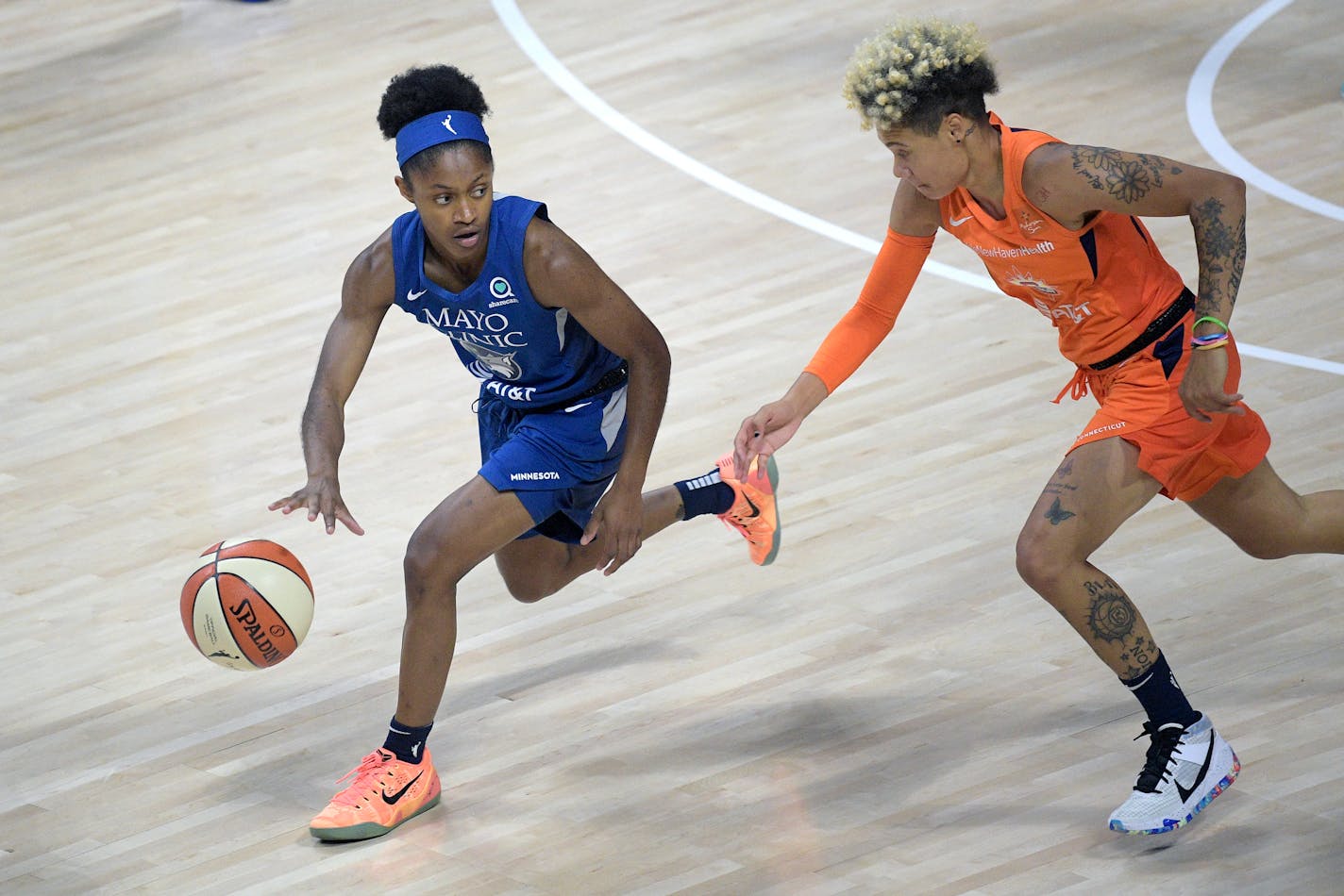 Lynx guard Crystal Dangerfield (left) has won her coach's confidence while helping to win key games.