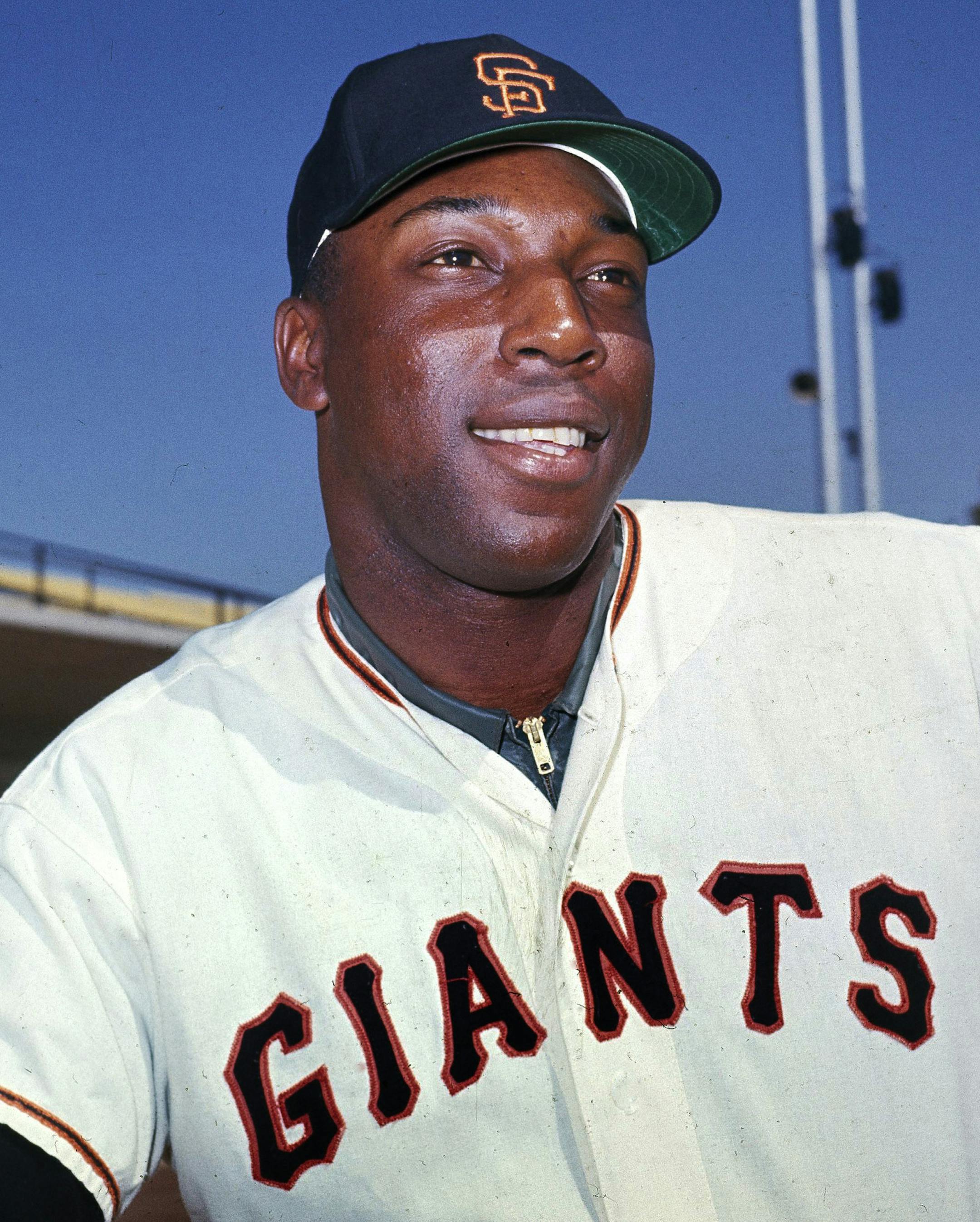 FILE - In this April 1964 file photo, San Francisco Giants' Willie McCovey poses for a photo, date and location not known. McCovey, the sweet-swinging Hall of Famer nicknamed "Stretch" for his 6-foot-4 height and those long arms, has died. He was 80. The San Francisco Giants announced his death, saying the fearsome hitter passed “peacefully” Wednesday afternoon, Oct. 31, 2018, “after losing his battle with ongoing health issues.” (AP Photo, File)