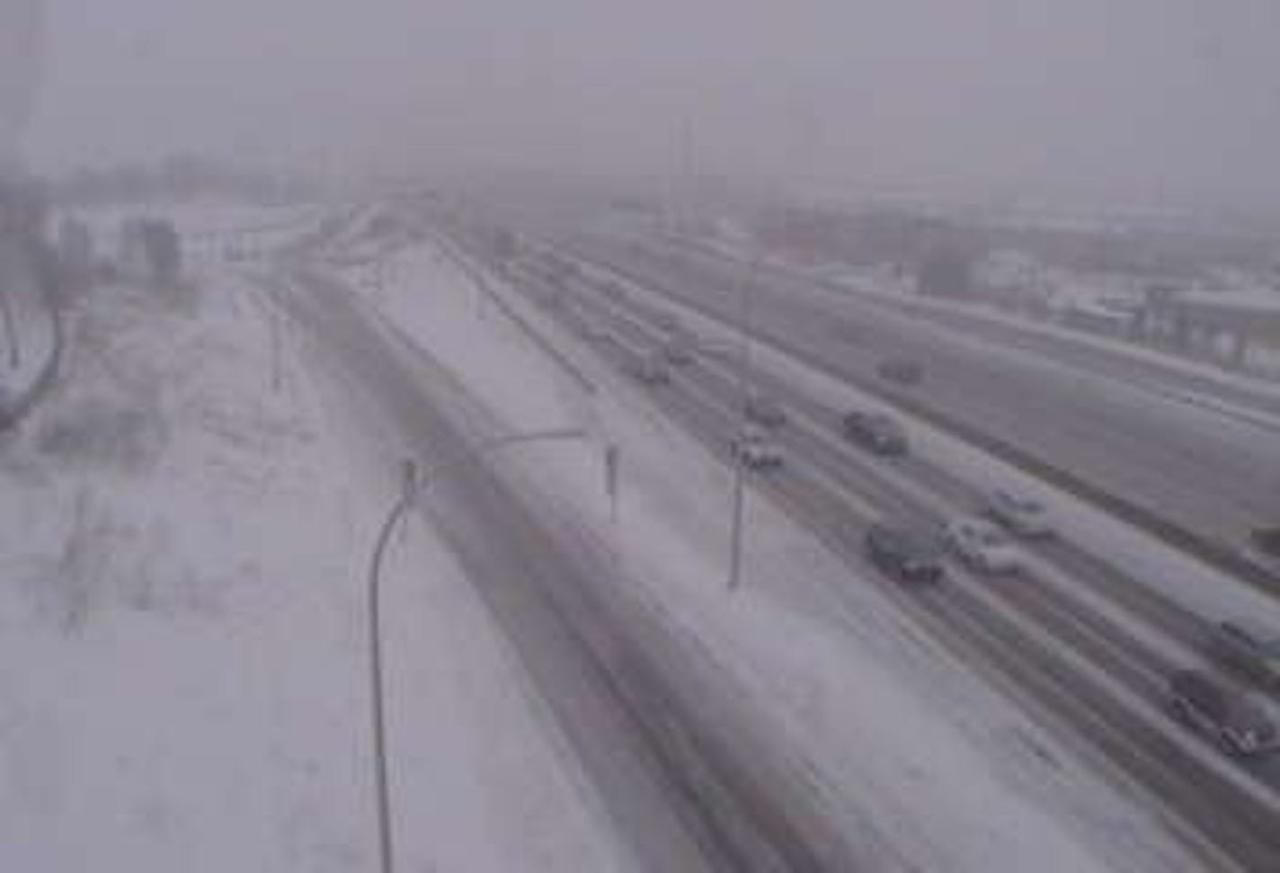 A burst of snow Thursday morning made for low visibility on I-35W southbound at Industrial Boulevard in Minneapolis, north of downtown.