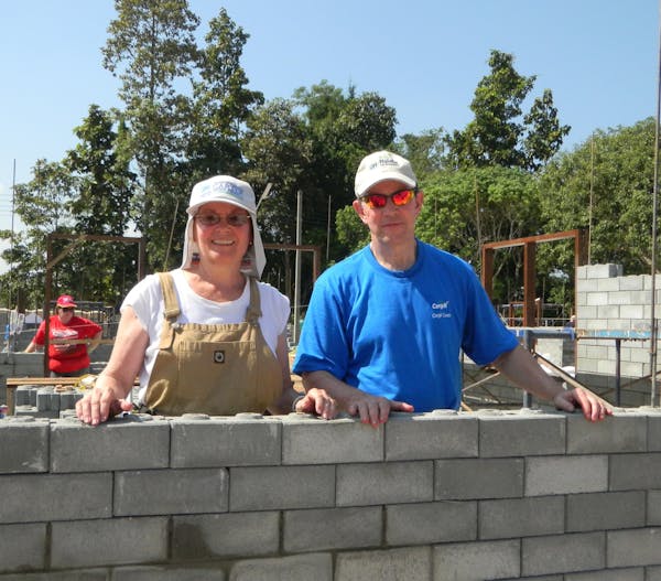 Mary Lynn and Warren Staley, who will be honored for their giving, shown at a Habitat for Humanity build several years ago.