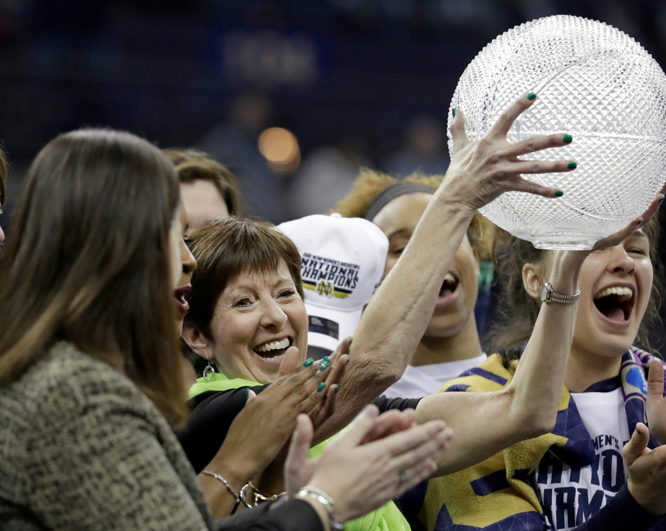 Notre Dame head coach Muffet McGraw celebrates after defeating Mississippi State in the final of the women's NCAA Final Four college basketball tournament, Sunday, April 1, 2018, in Columbus, Ohio. Notre Dame won 61-58. Notre Dame won 61-58. (AP Photo/Tony Dejak)