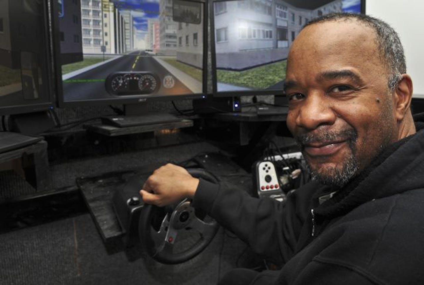 Brian Troutman, 52, sat in the simulator of a semitractor-trailer rig recently at the Interstate Truck Driving School in South St. Paul. He lost his position with a bank in 2008 after 21 years on the job.