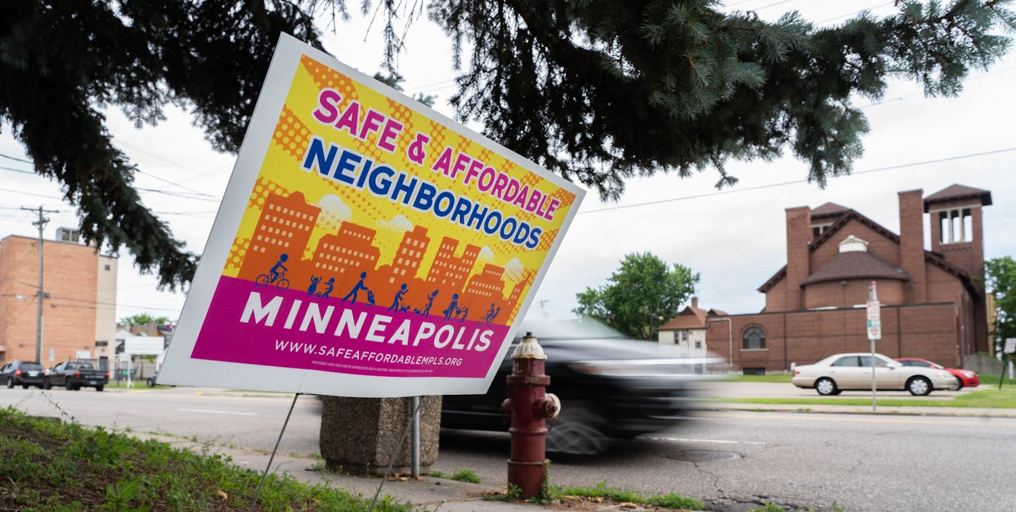 Pink and yellow lawn signs have begun to appear in front of homes and apartment buildings in North East Minneapolis. ] MARK VANCLEAVE &#xa5; The Safe and Affordable Neighborhoods campaign from the the Minnesota Multi Housing Association is fighting a draft city council ordinance that would limit how prospective tenants are screened. Photographed Friday, Jun 21, 2019 in North East Minneapolis.